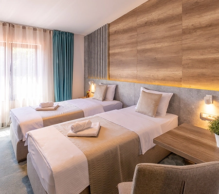 Hotel room with two single beds