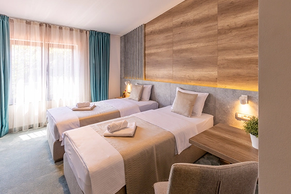 Hotel room with two single beds